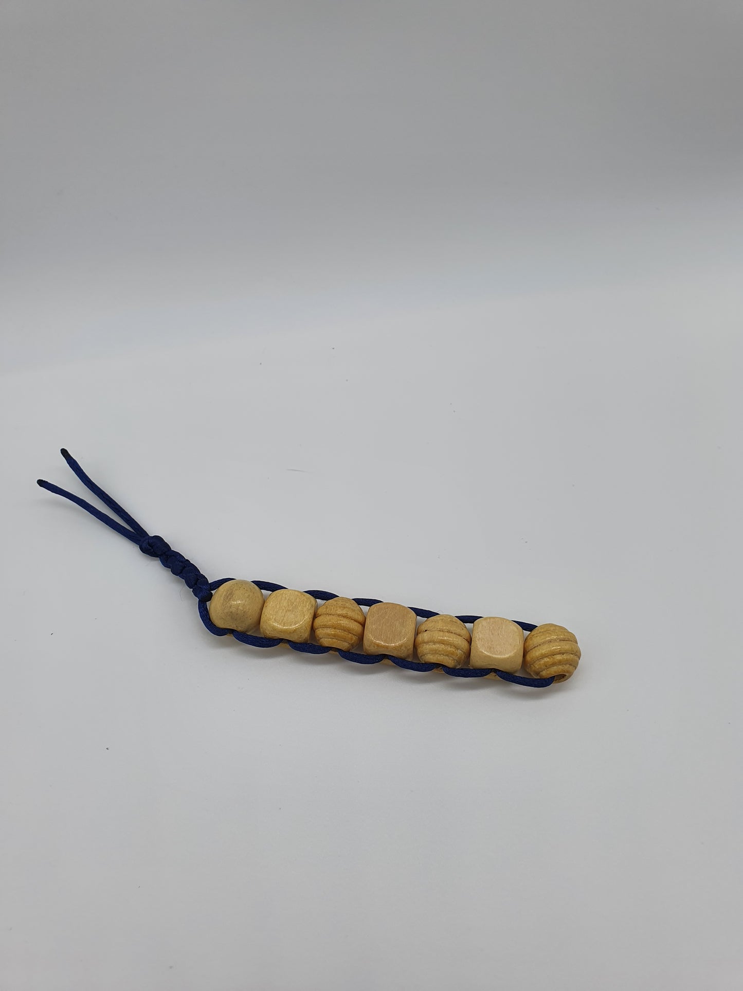 Textured wood bead fidget toy