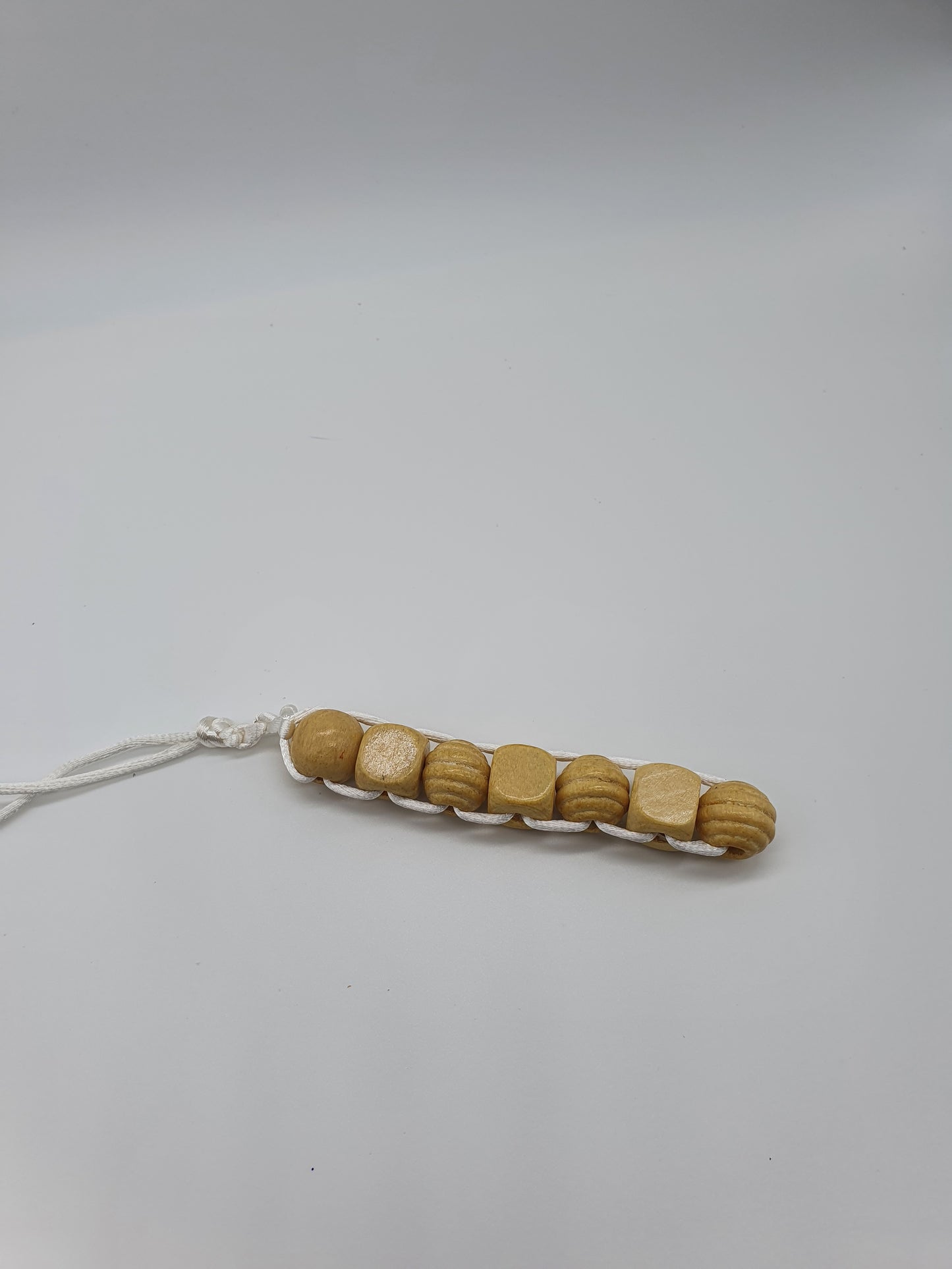 Textured wood bead fidget toy