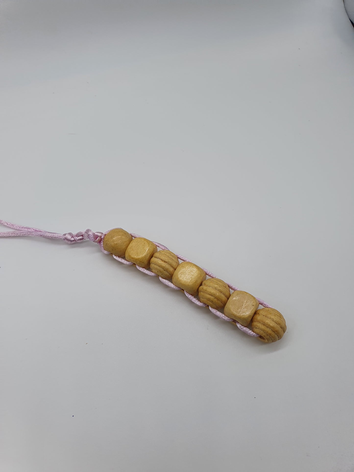 Textured wood bead fidget toy