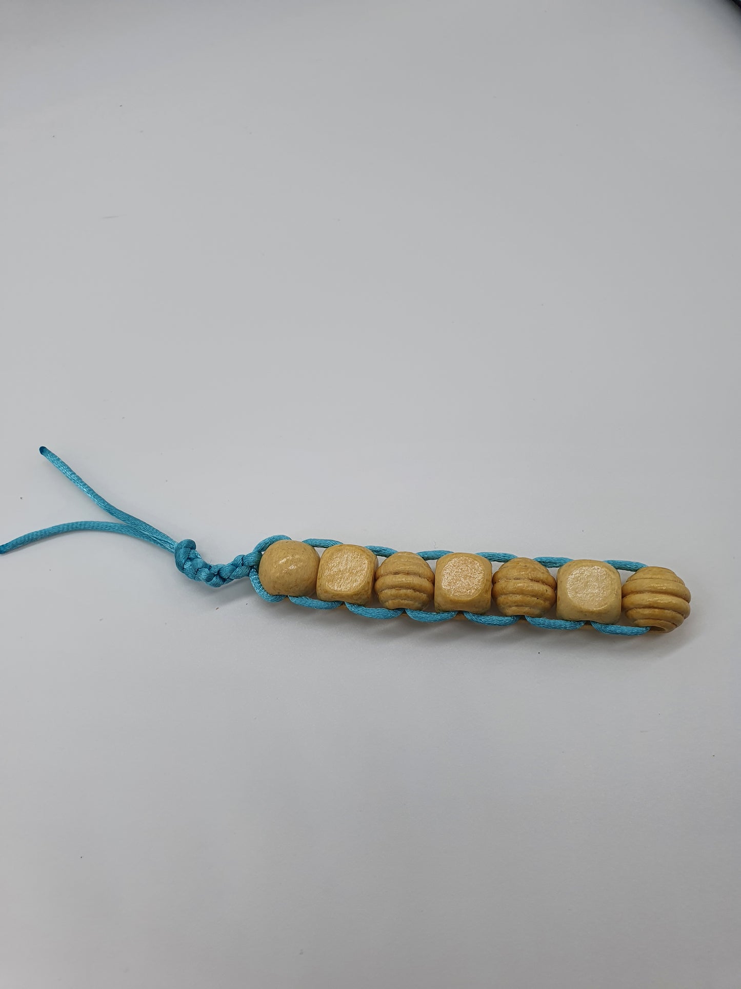 Textured wood bead fidget toy