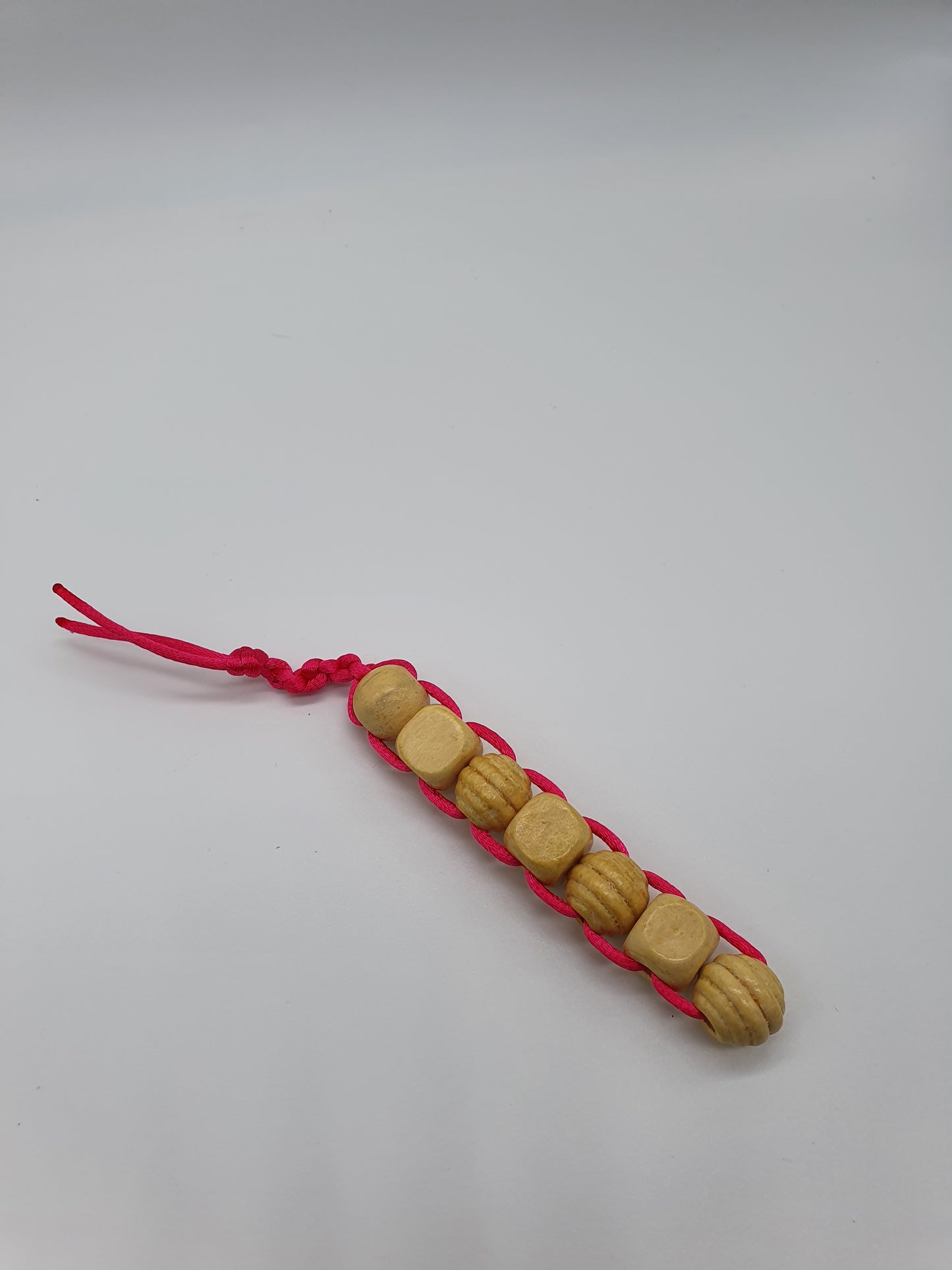 Textured wood bead fidget toy