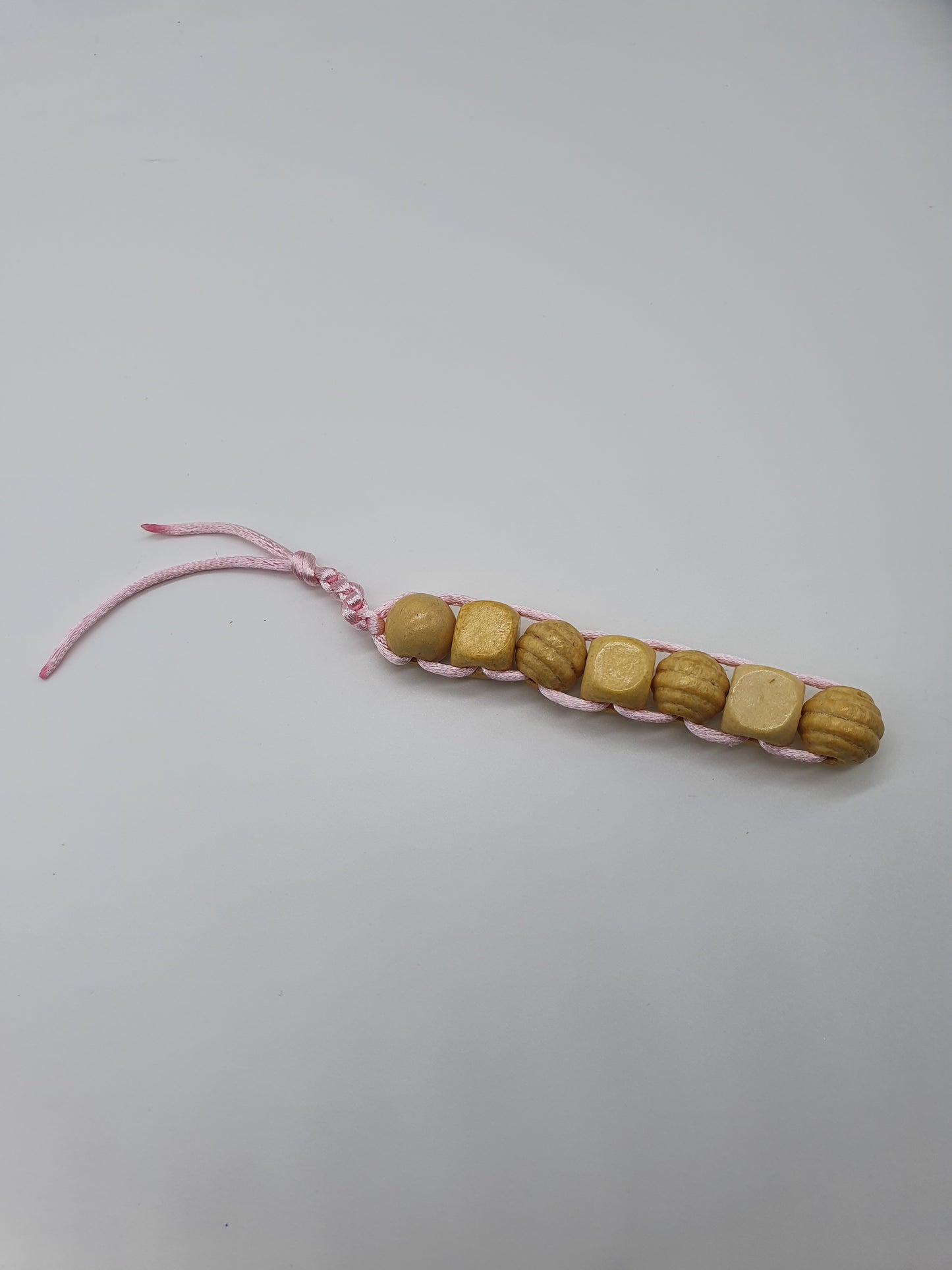Textured wood bead fidget toy