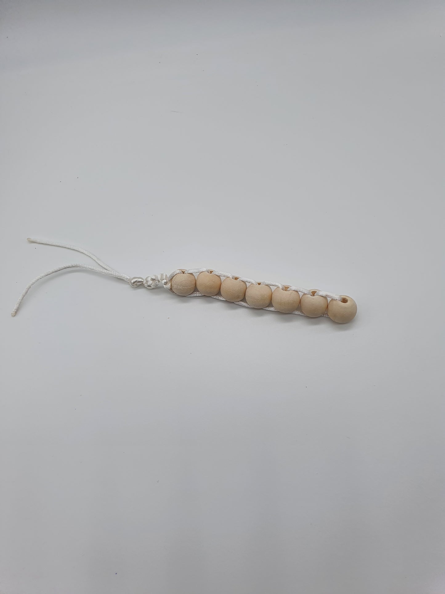 Smooth wood bead fidget toy