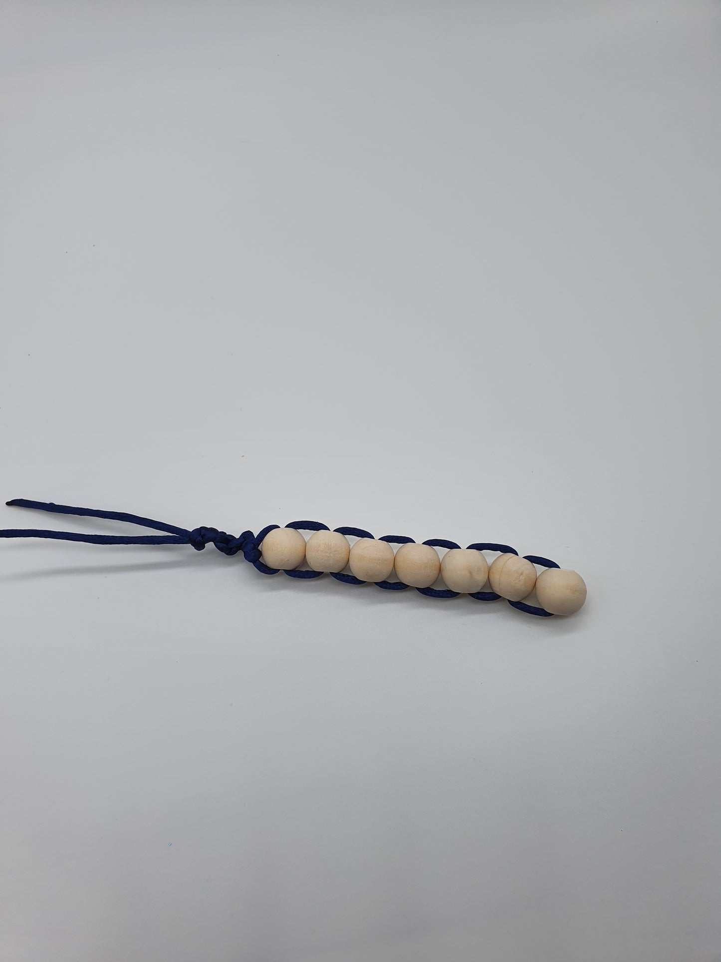 Smooth wood bead fidget toy