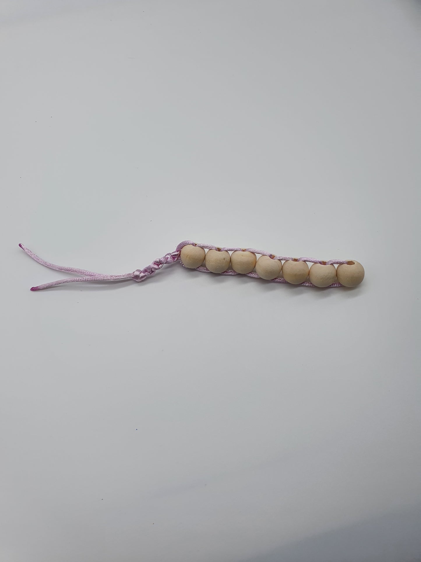 Smooth wood bead fidget toy