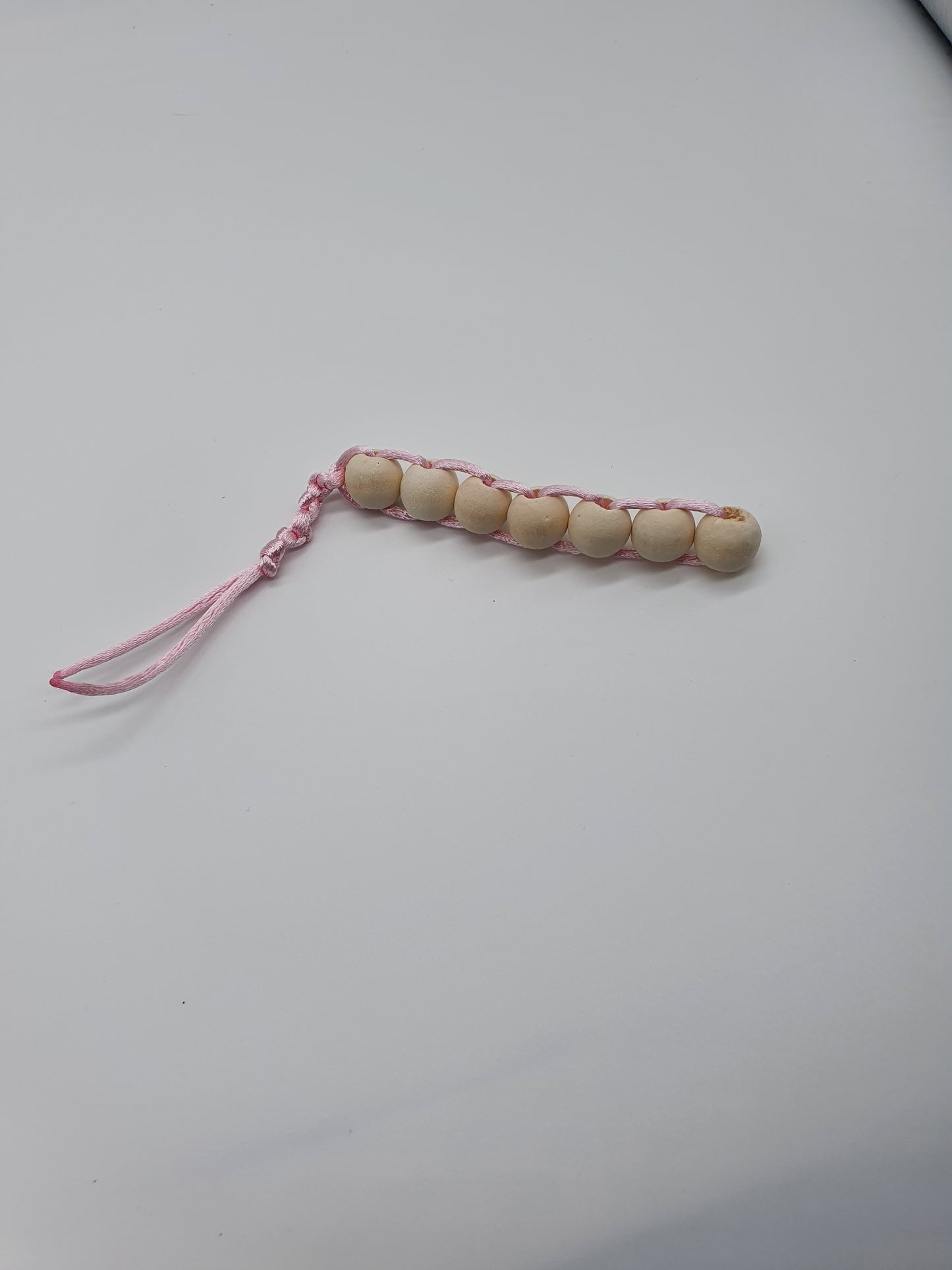 Smooth wood bead fidget toy