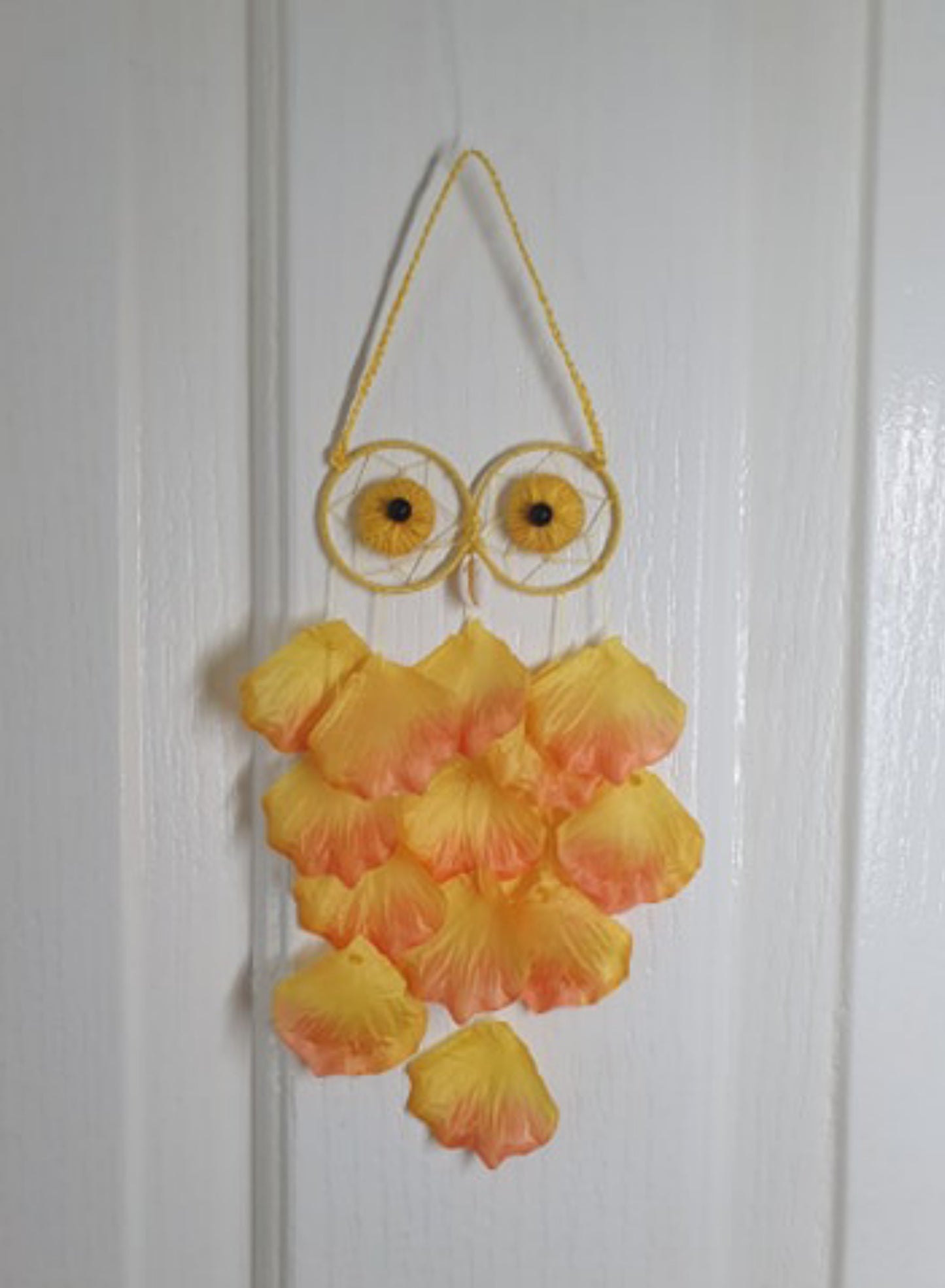 Sweet Light and Flowery Protective Petal Owl Dreamcatcher hanging.